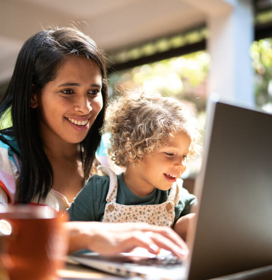 Mother and daughter on laptop