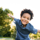 Young smiley boy outside