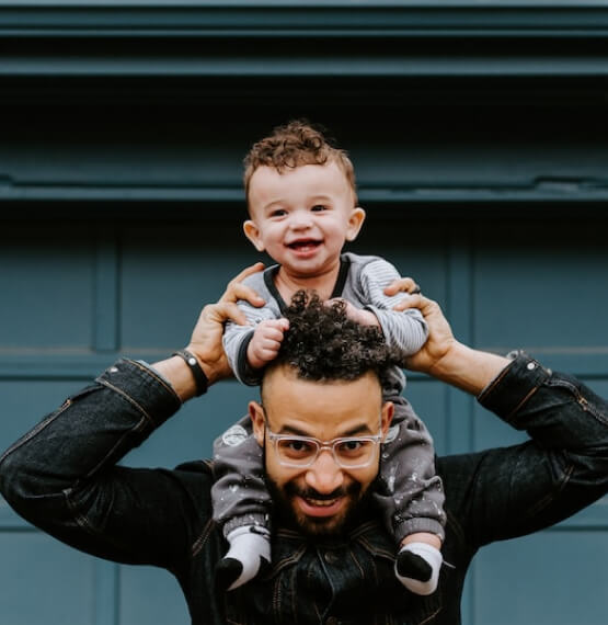 Son on dad's shoulders