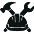 construction hat icon with hammer and wrench representing full-service construction