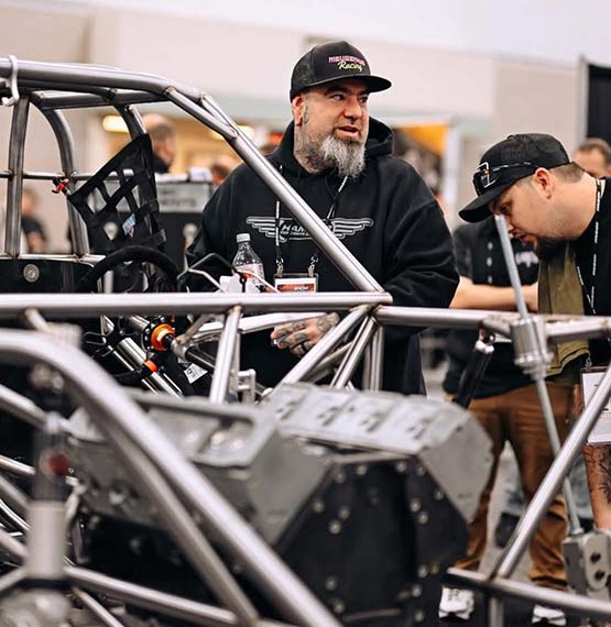 Nieuwenhuis team working on a racecar fabrication