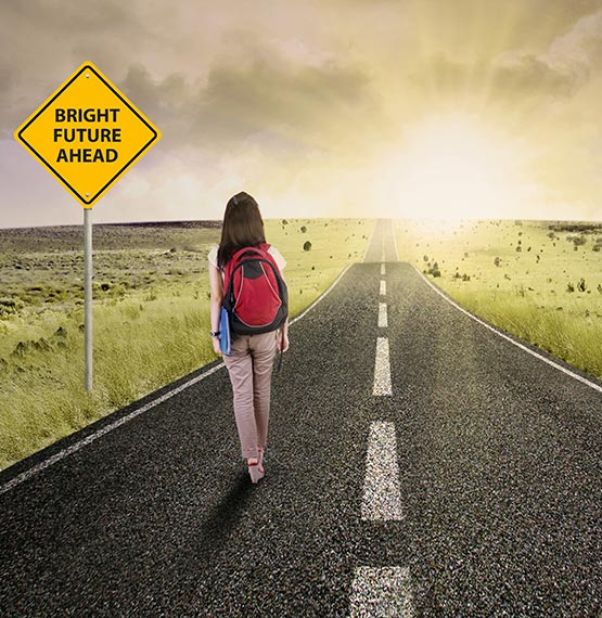 teen girl walking down the road toward a bright sun with a road sign saying "Bright Future Ahead"