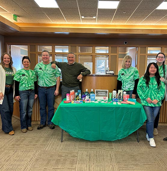 Weston AbbyBank team with hygiene items they collected for Peyton's Promise on St Patrick's Day