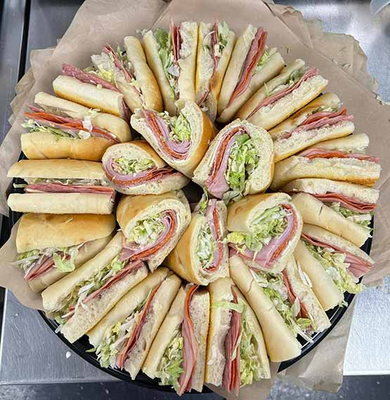 platter of subs from Philly's Subs & Gyros in Schofield, WI