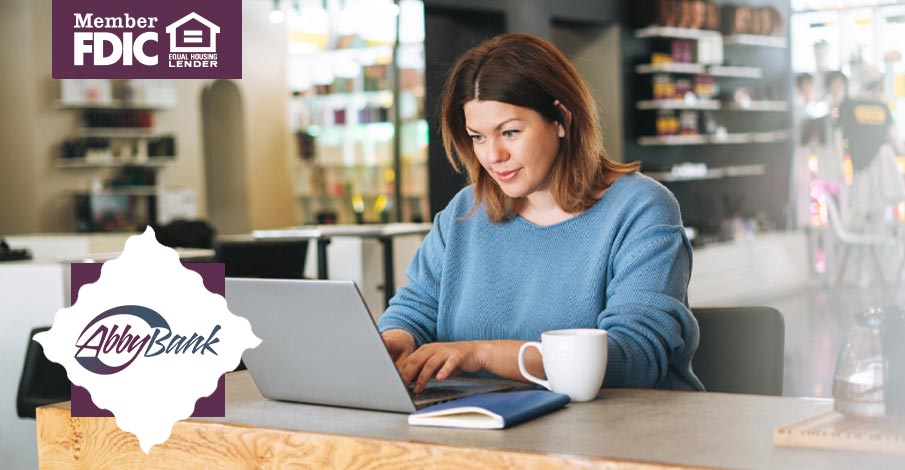 middle-aged business woman working on laptop