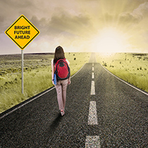 teen walking down road with Bright Future Ahead road sign
