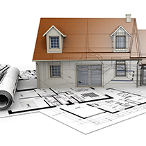 blueprint and model of house under construction