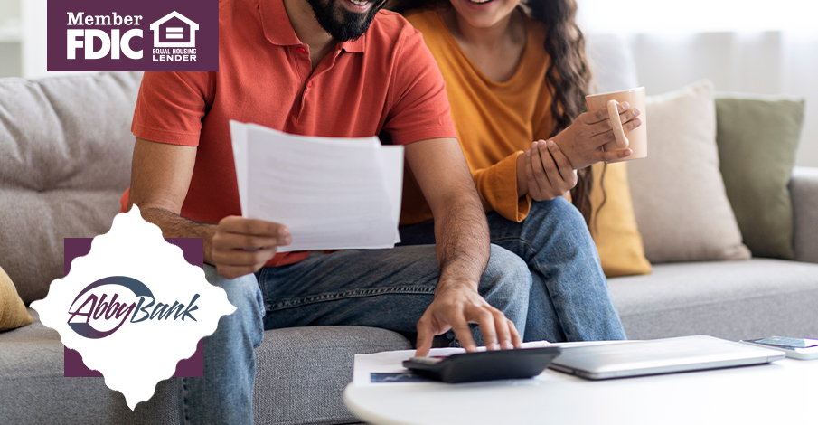 couple looking at bank statements 