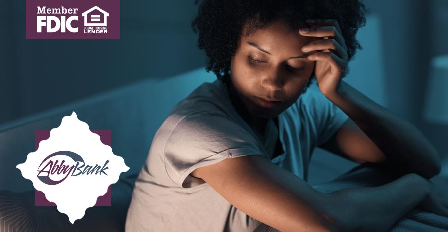 young adult woman awake during night due to stress